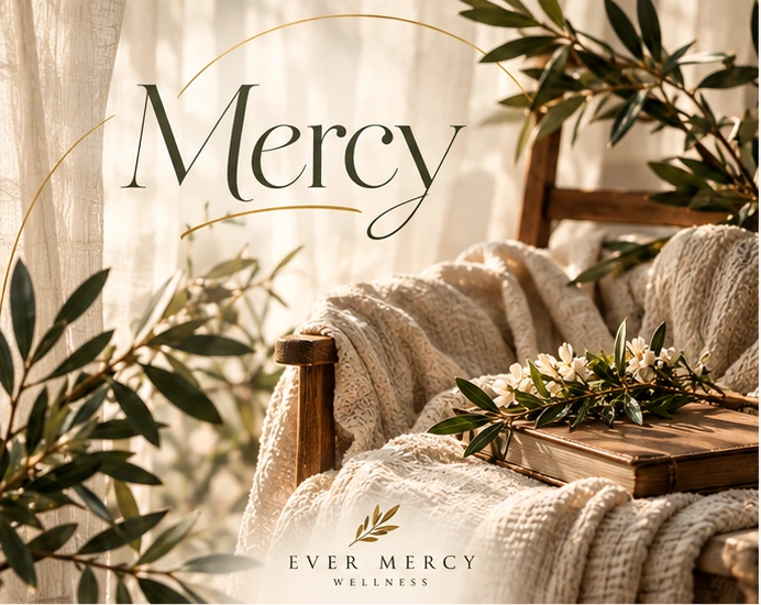 Ever Mercy branded Mercy artwork: a warm chair, soft blanket, botanical details, and a closed book in gentle natural light.